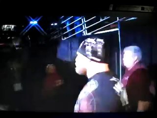 Brock Lesnar pushes Cop