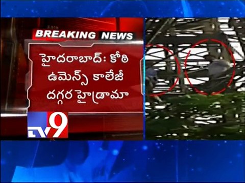 Students climbs hoarding ,demands Govt to back lands