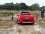 HSV Maloo flat out in mud