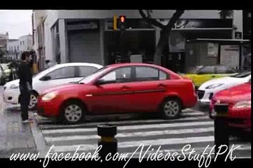 Good Job done by a boy When a person park his car on Zebra-Crossing