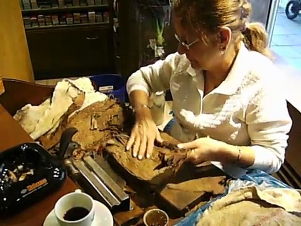 Norma Fernández Sastre Rolls A Havana Cigar