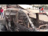 شهود عيان: متظاهرو جامعة القاهرة أشعلوا النار في سيارة  الـ«سي بي سي»