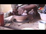 قرية تونس بالفيوم.. صناعة الفخار تقاوم الكساد
