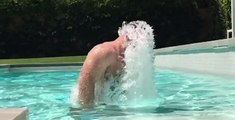 Slow Motion Clip Captures Dramatic Dive Into Pool