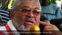 President Jerry John Rawlings speaks to Phillip Nyakpo