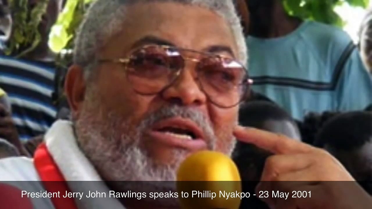 President Jerry John Rawlings speaks to Phillip Nyakpo