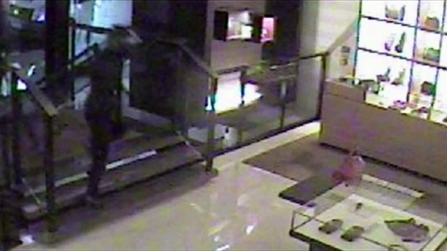 Moment man tackles machete wielding robber