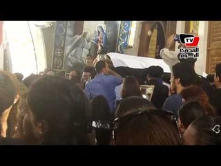 علم مصر يتقدم جنازة قس شمال سيناء مينا عبود