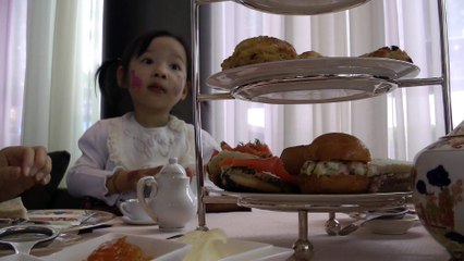 Girl Having Afternoon Tea