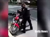 Mexico Officer Throw Punches On Biker -- Bare knuckle pavement fight --