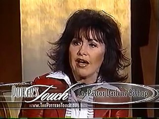 Darlene Bishop prays over breast cancer