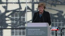 Merkel in anti-Semitism warning as survivors mark Nazi camp's liberation