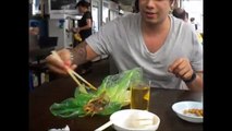 Eating live baby octopus (산낙지, sannakji) in Noryangjin, Seoul.