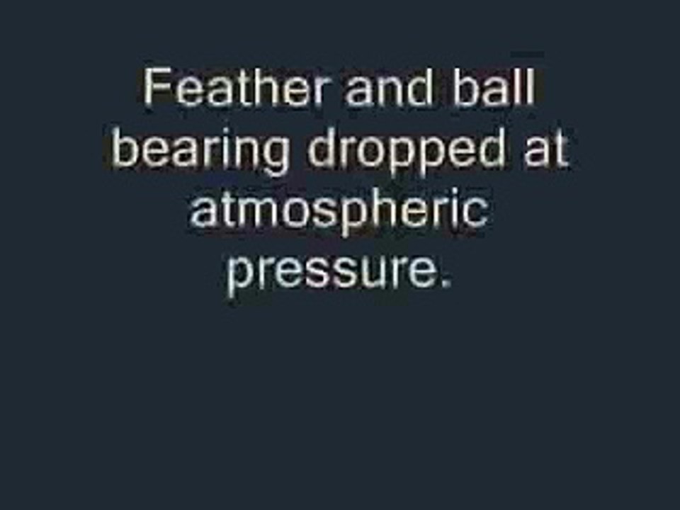 Feather and Ball Bearing Dropped in Vacuum
