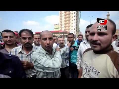 عمال مصنع «السامولي» يقطعون طريق المحلة