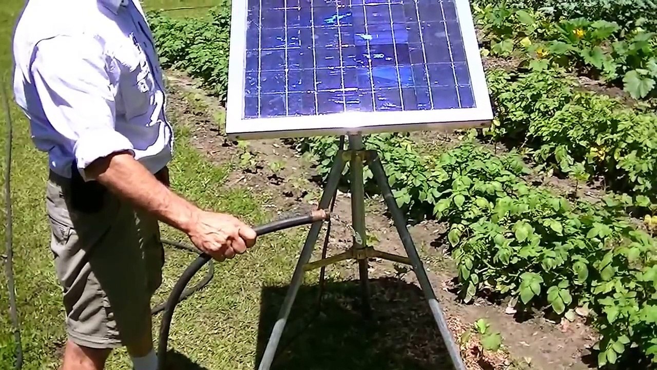 Portable solar water pump/ no battery water garden, tripod mount.