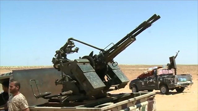 قوات فجر ليبيا تواصل حصار قاعدة الوطية الجوية