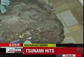 UFO Tsunami Japan strange Object leaving sea