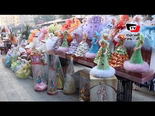 عروسة المولد.. ترقص وتغني وترتدي ملابس جيش