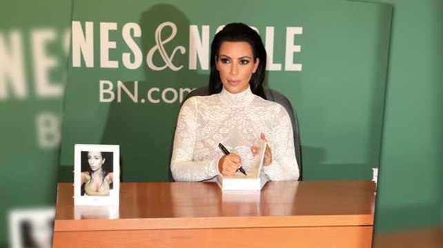 Kim Kardashian Promotes 'Selfish' In Sheer Lace Top