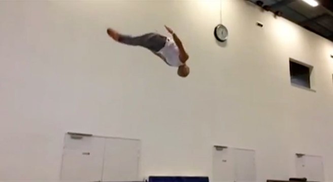 Acrobat Practices Flips in an Inspiring Workout