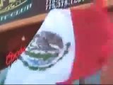 Mexican Flag Flying over American Flag
