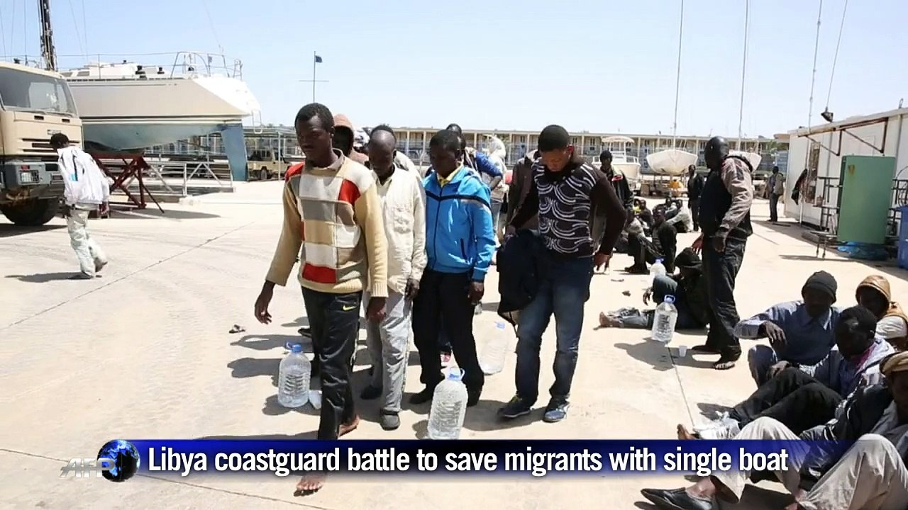 Libya coastguard battle to save migrants with single boat