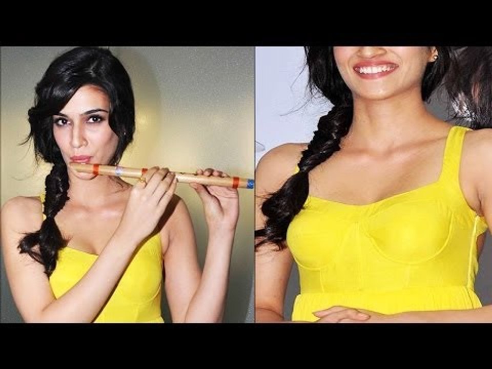 Sexy Kriti Sanon Exposing Hot Assets In Deep Neck Yellow Dress