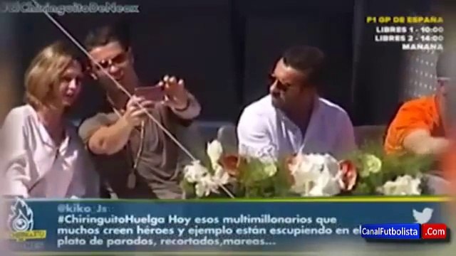 Cristiano Ronaldo takes selfies with adoring fans while watching tennis at Madrid Open