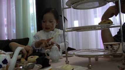 Girl Having Afternoon Tea*