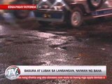 Manila floods leave garbage, potholes