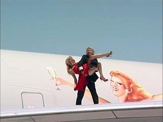 Embarrassment for Pamela Anderson as Richard Branson turns her upside down