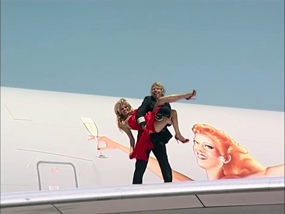 Embarrassment for Pamela Anderson as Richard Branson turns her upside down