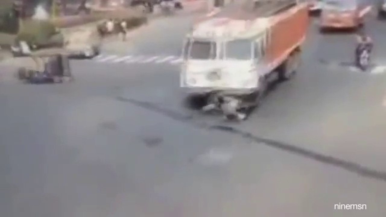 Speeding Truck Hits a Woman- Caught on Camera video by tayyab