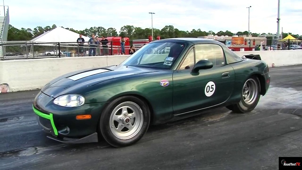 TESLA P85 Gets ZAPPED by Electric MIATA !!  - 1/4 mile Drag Race Video - Road Test TV