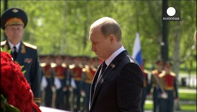 Putin and Merkel agree Ukraine peace deal not being respected