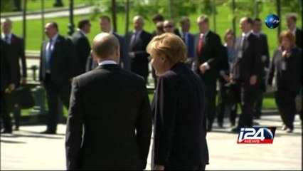 بوتين وميركل يجتمعان لتسوية الازمة الاوكرانية