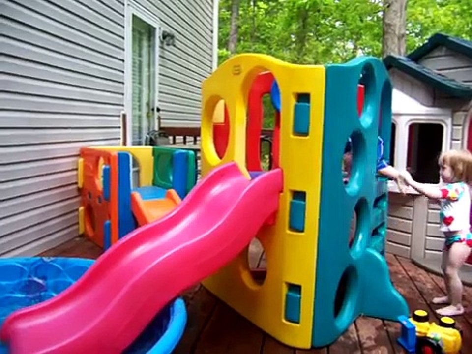 Twins Playing in the Pool