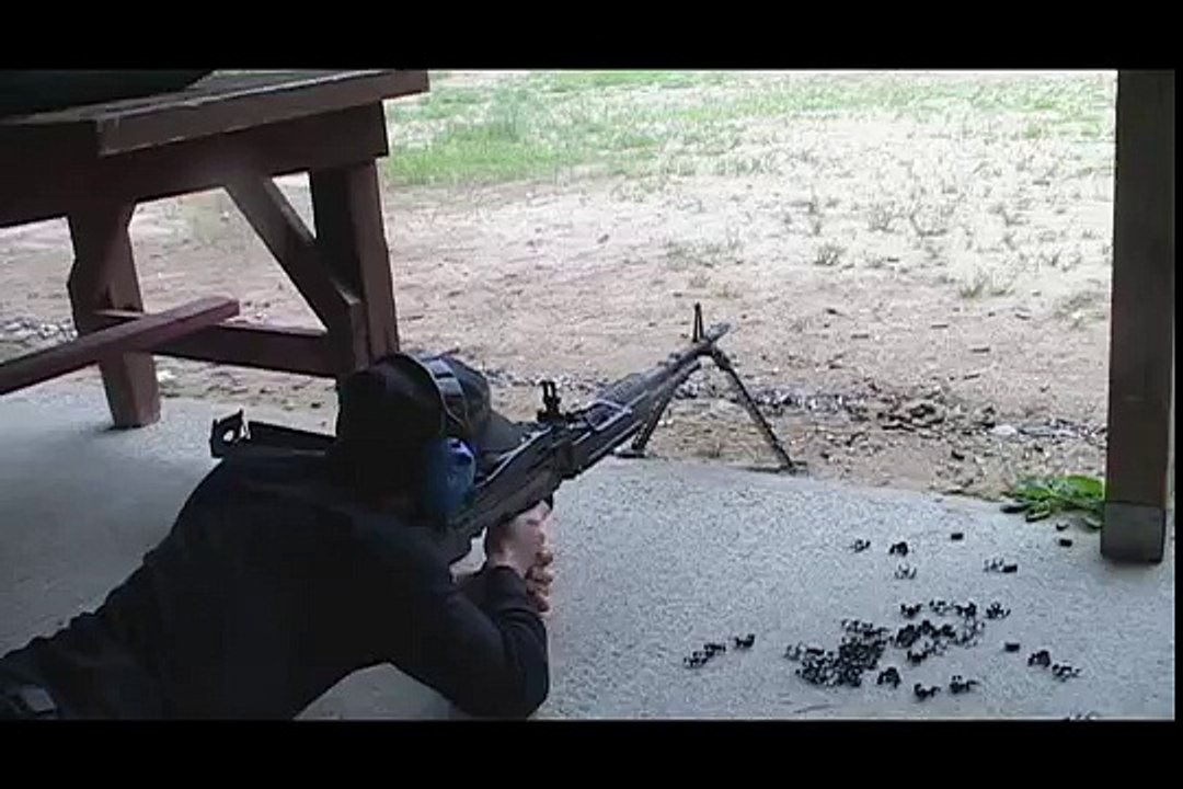 Firing a M60 machine gun fully automatic