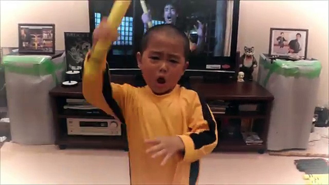 My son(5year old) acting Bruce Lee's nunchaku scene