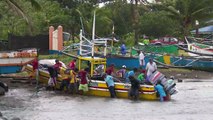 Two dead as powerful typhoon clips north Philippines