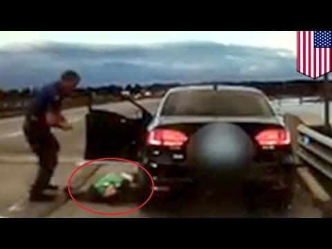 Policía captado en video salvándole la vida a conductor que sufrió una sobredosis por heroína