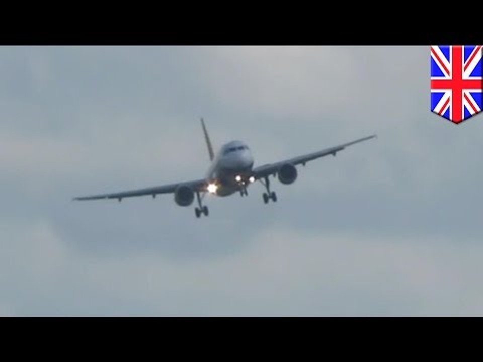 Dramatic Airplane Video: Airliner lands almost sideways during high winds - TomoNews