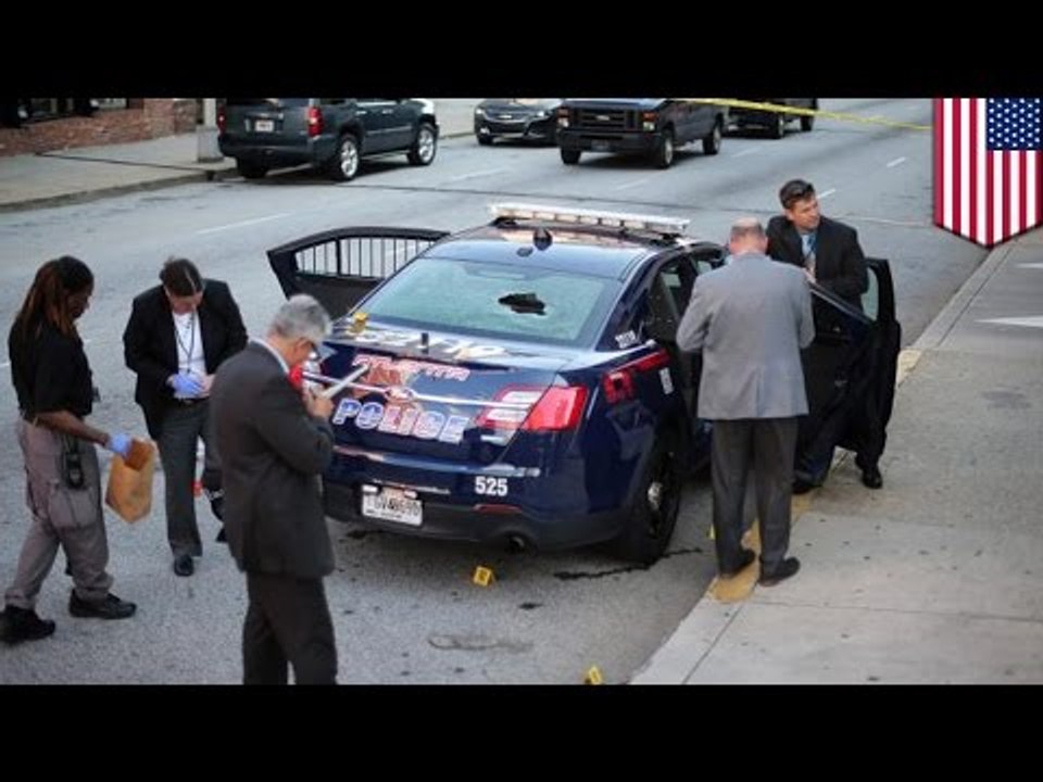Atlanta shootout: woman shoots at cops while inside patrol car - TomoNews