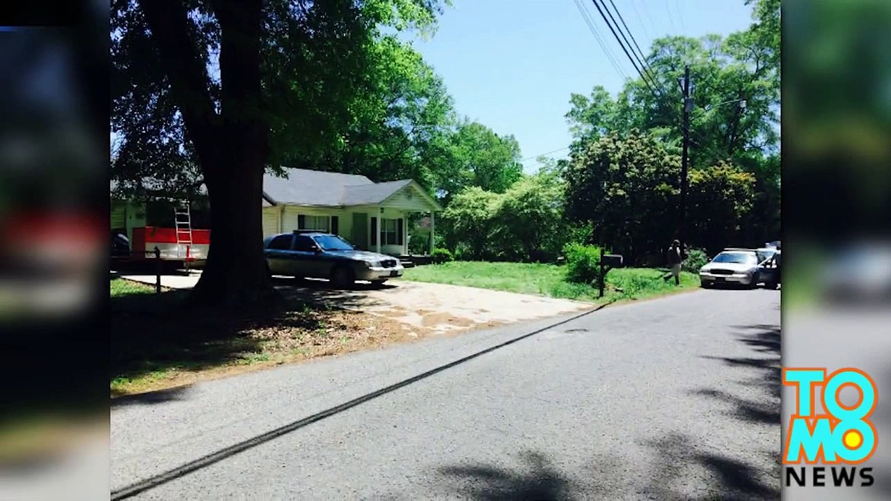 الأب يستخدم ابنه كدرع بشري أثناء تبادل اطلاق الرصاص خلال عملية سطو مسلح