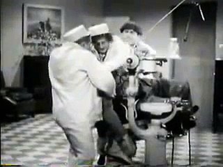 The Three Stooges pull a tooth out