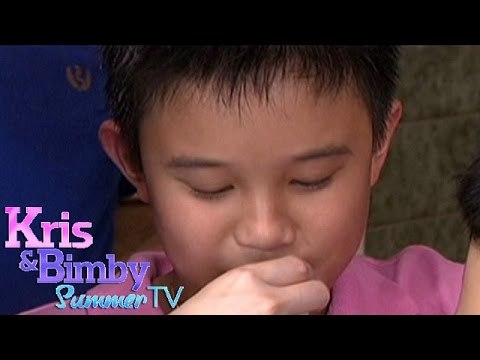 Kris encourages Bimby to eat balut