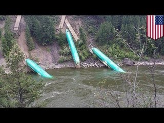 Plane fuselages tumble into Montana river after train derailment