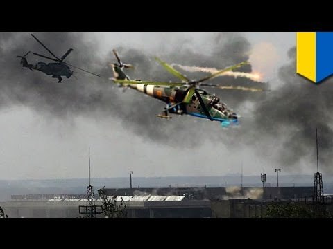 Ukrainian military uses heavy firepower in major assault to retake Donetsk Airport