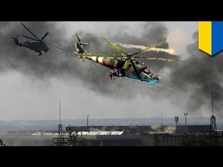 Ukrainian military uses heavy firepower in major assault to retake Donetsk Airport